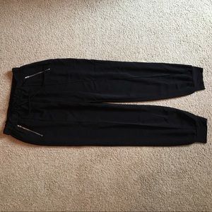 Black jogger-style trousers